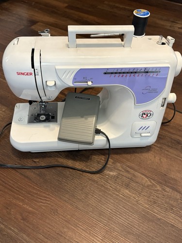 Singer sewing machine 150 year - machine,