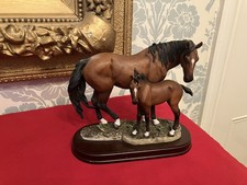 LEONARDO HORSE AND FOAL FIGURE ON WOODEN PLINTH