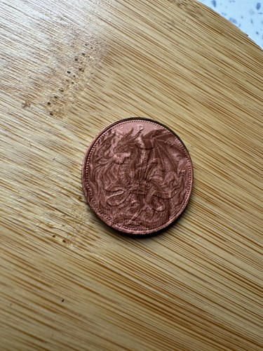 Unusual dragon coin - 🐉,