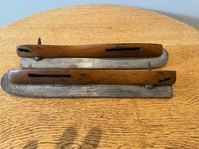 Antique Wood And Steel Ice Skates winter sports display. 