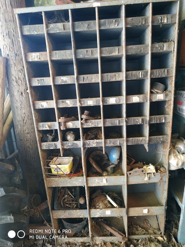Workshop pigeon hole shelves.