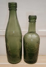 PAIR Old Antique CLITHEROE Bottles - TEMPEST SEEDALL & J TAYLOR both PICTORIAL