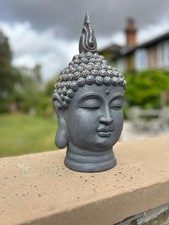 Grey buddha head stone - head,