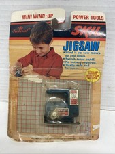 Vintage WIND UP TOY JIGSAW