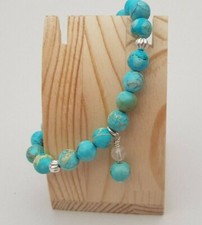BLUE VARISCITE, CRACKLED QUARTZ AND STERLING SILVER STRETCHY BRACELET.