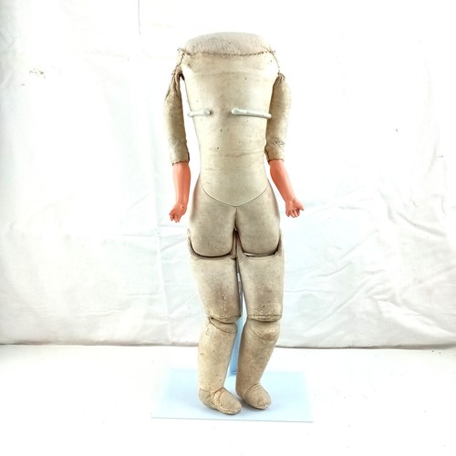 Antique leather doll body