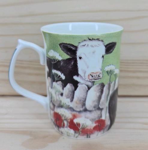 China mug featuring cow design - mug,