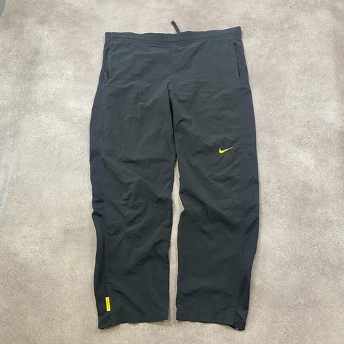 Nike track pants - mens, large