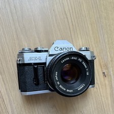 Canon slr camera silver - ae-1,
