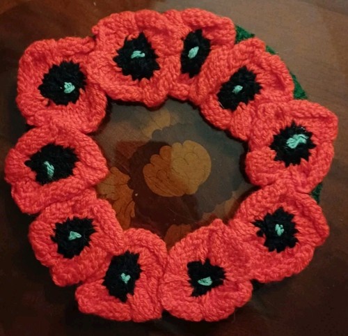 Hand knitted poppy - knitted,