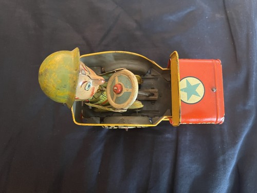 Joe jouncing jeep tin toy - gi,