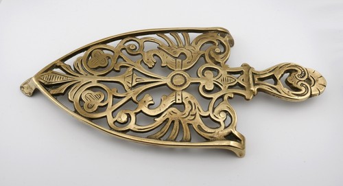 Lovely ornate brass trivet - lovely,