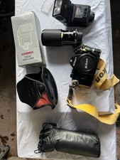 Nikon EM SLR camera with flash