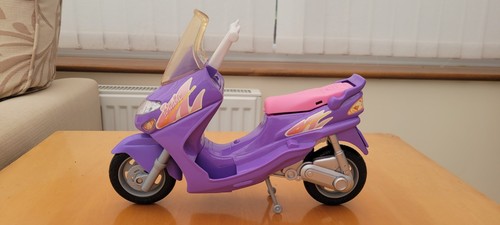 Barbie doll purple scooter - barbie,