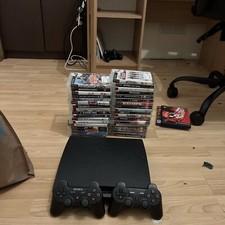 PS3 Slim with 39 Games + 2