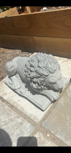 Stone garden laying lion - stone,