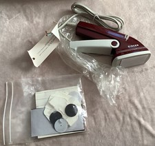 Singer  Q-100A Hole Mender -