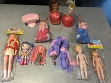 D. Vintage mixed dolls toys