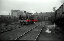 PHOTO  SR 'N' CLASS 31874 AT EXMOUTH JUNCTION WHILE ON THE LEFT IS REBUILT BULLE