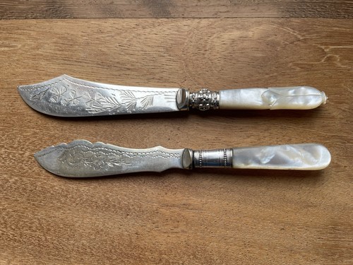 Two mother pearl handled - of,