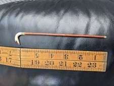 miniature market stick swan in