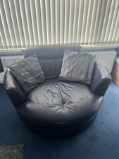blue DFS  leather swivel chair