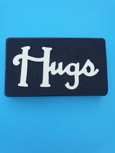 Sizzix die cutter phrase hugs - die,