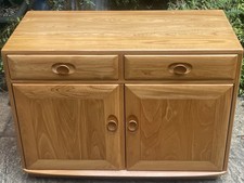 FINE  MODERN TWO DOOR  ERCOL SIDEBOARD- WE DELIVER