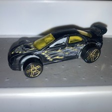 Hot Wheels 2005 first edition Subaru Impreza WRX Torpedoes black and gold loose