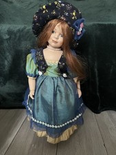 Beautiful D.S.Nicholass Porcelain Doll With hat. Highly collectible! 