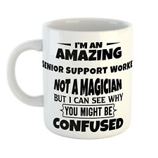 I'M AN AMAZING SENIOR SUPPORT WORKER NOT A MAGICIAN YOU'RE CONFUSED MUG GIFT DAD