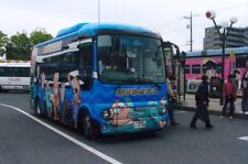 BUS PHOTO OF A MINICOACH ADVERT PHOTOGRAPH OVERSEAS PICTURE 7-79 CARTOON LIVERY.