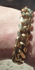 bracelet  curb link  gents heavy 18k  gold plated .  8 inches long..,