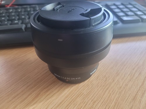 Sigma 56mm dc dn - dc,