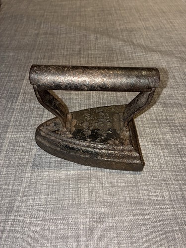 Antique flat iron - sad,