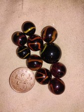 Ten Black And Yellow Glass Hornet Marbles