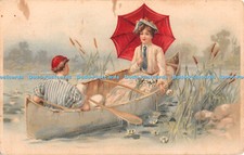 R435152 A woman with a red umbrella sits in a boat with a man Stewart and Woolf