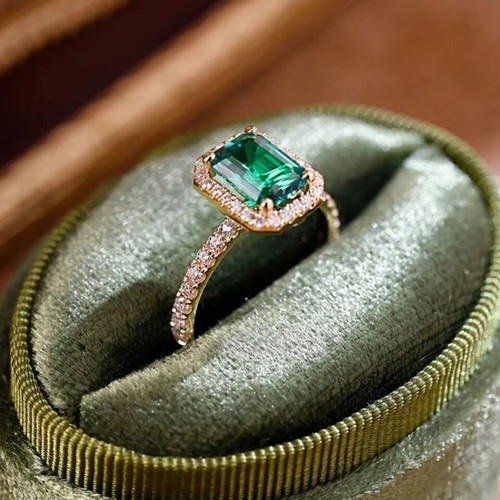 Emerald cut green diamond - cut, halo
