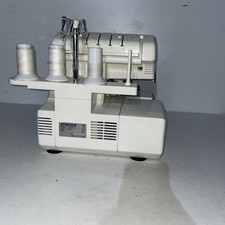 Singer 14U4554 90w Four Thread Overlocker without the pedals selling as seen. 