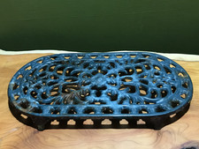 Vintage Cast Iron Trivet Blue