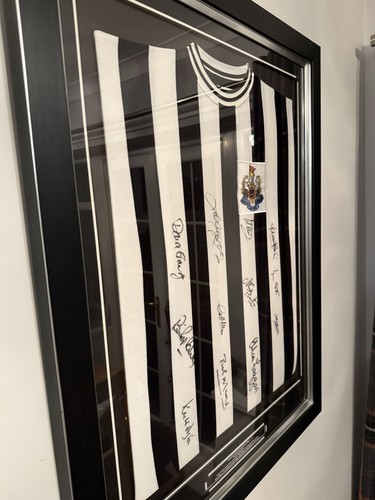 Framed signed newcastle united - framed,