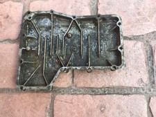 Suzuki GS1000 sump plate with drain plug bung. Used.