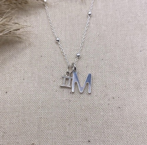 Silver star sign - and, initial
