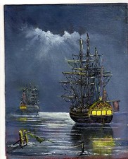 Ornately framed oil on canvas of Two Naval Sailing Warships in moonlight