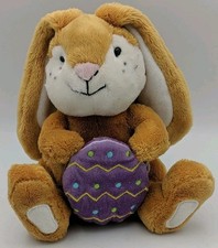 Russ Berrie Rabbit holding a