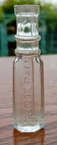 Very small poison bottle - poison,