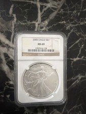 2005 silver proof coin - £5,