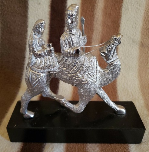 Silver colour metal - metal, camel