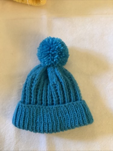 New hand knitted bobble hat - hand,