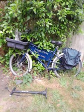 vintage pashley cargo bike with sign writing plate